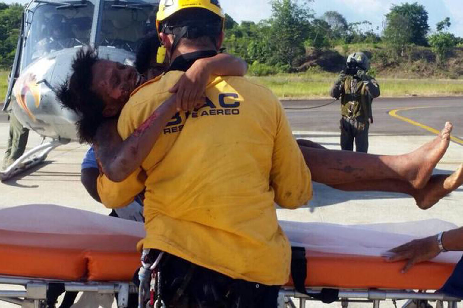 'MIRACLE' SURVIVORS: In what some have hailed as a miracle, Ms Nelly Murillo (above, being carried by a rescue worker) and her infant son survived a plane crash in a dense jungle in Colombia that claimed the pilot's life. The 18-year-old mother and h