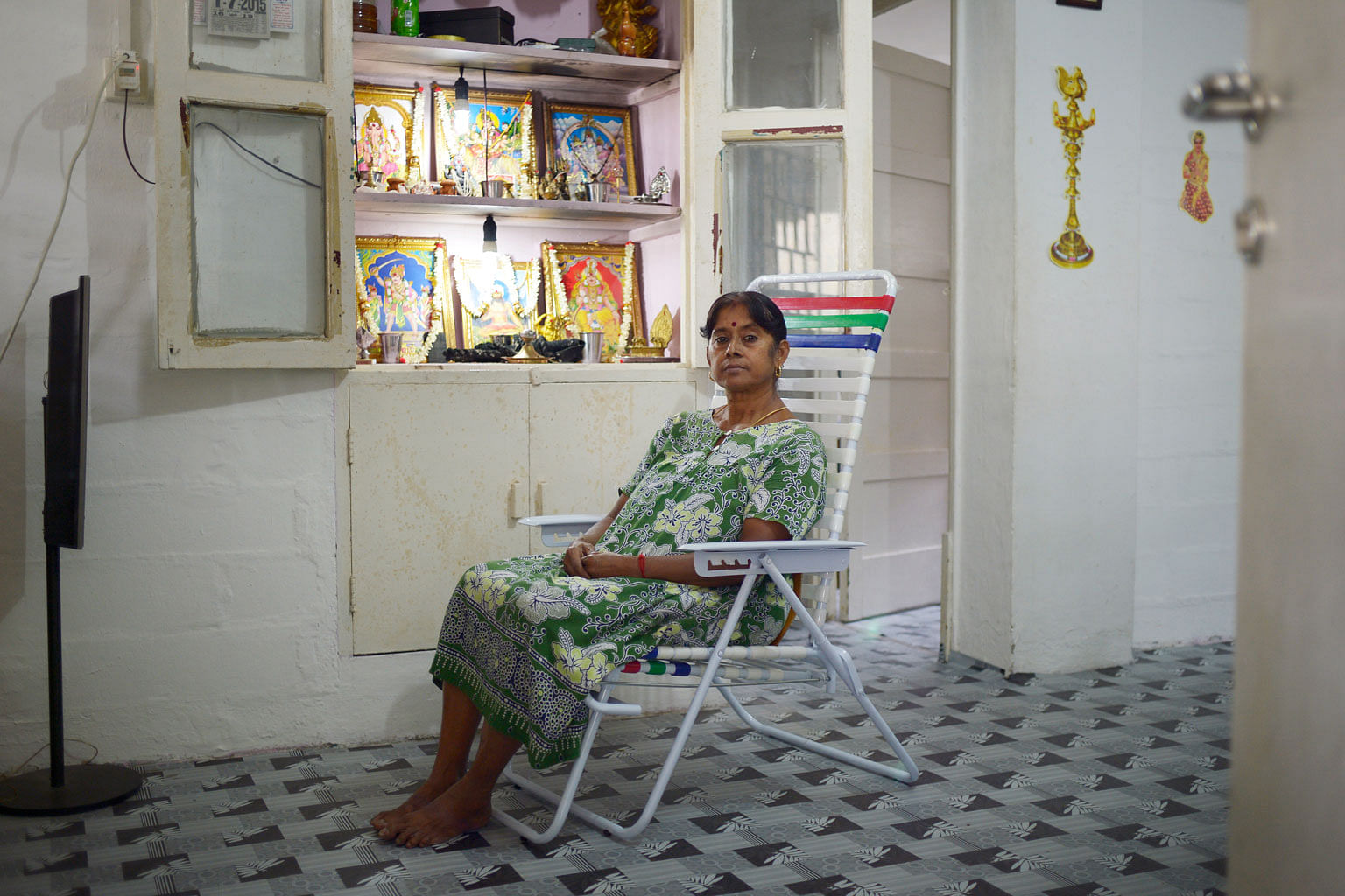 Madam Velu Rukumani, 61, has lived in the estate for 14 years. She says she will miss her seventh-floor Chinese neighbour most, even though the women do not know each other's names and just call each other "auntie".