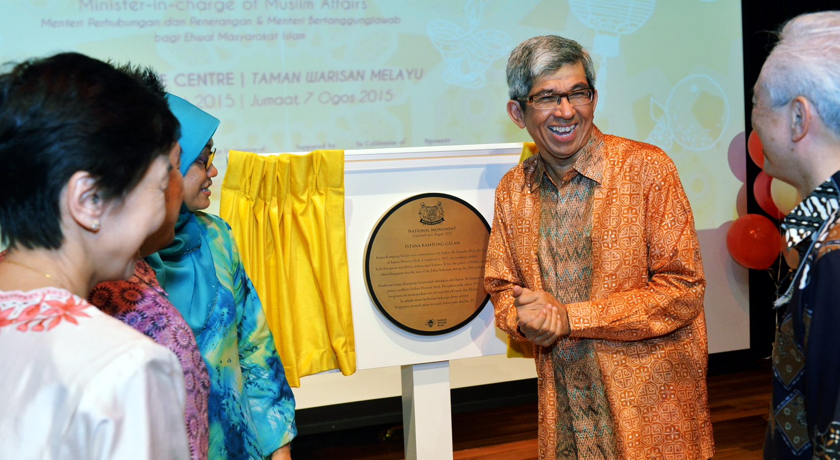 Communications and Information Minister Yaacob Ibrahim unveiling the national monument plaque for Istana Kampong Gelam yesterday. The 172-year-old building is the country's 70th national monument.