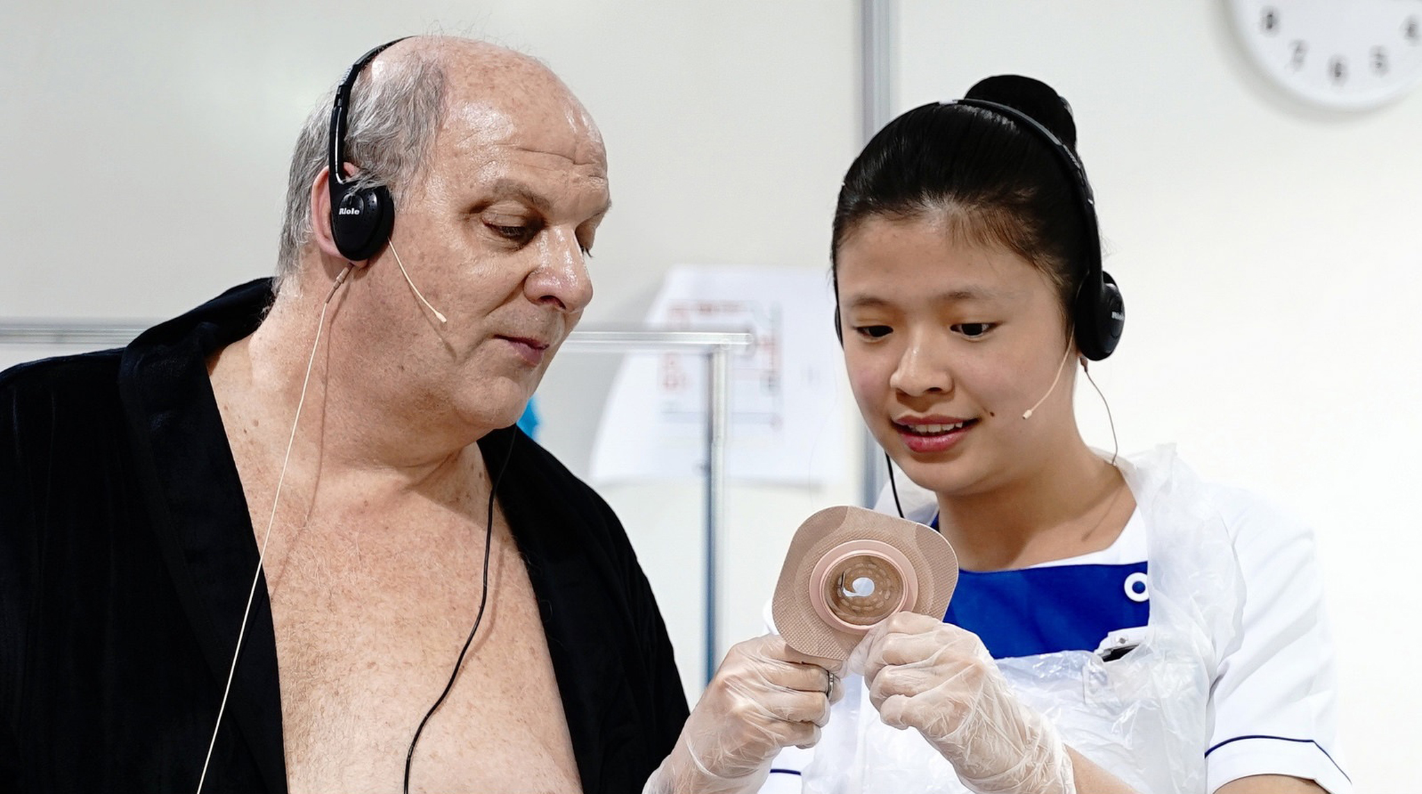 Ms Lim Ling, a second-year student from Nanyang Polytechnic, seen here with her "patient" at at the biennial WorldSkills contest, dubbed the "Olympics of Skills". She took the bronze medal in the health and social care category.