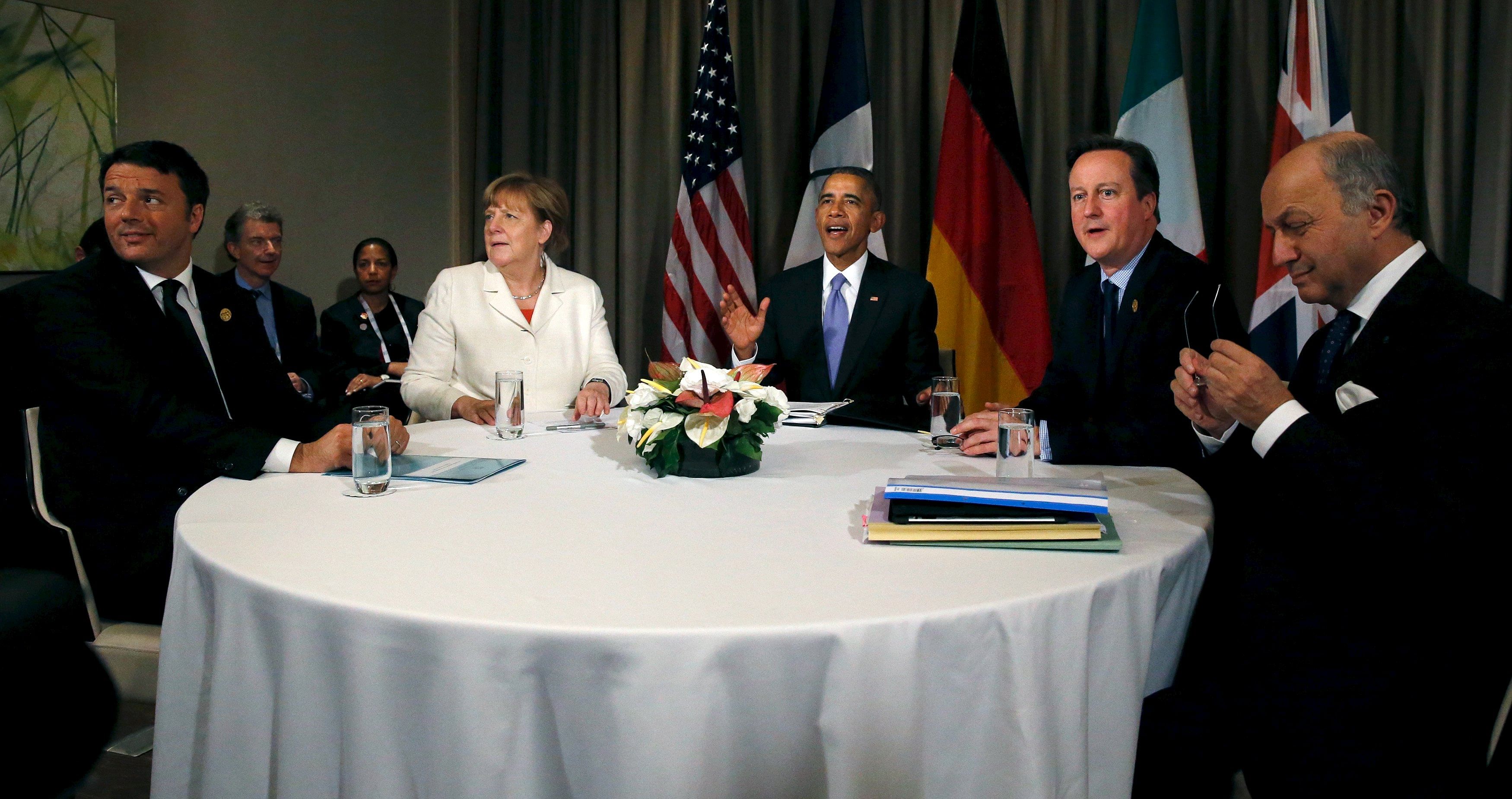 (From left) Italy's Prime Minister Matteo Renzi, Germany's Chancellor Angela Merkel, US President Barack Obama, Britain's Prime Minister David Cameron and France's Foreign Minister Laurent Fabius at a multilateral meeting yesterday.