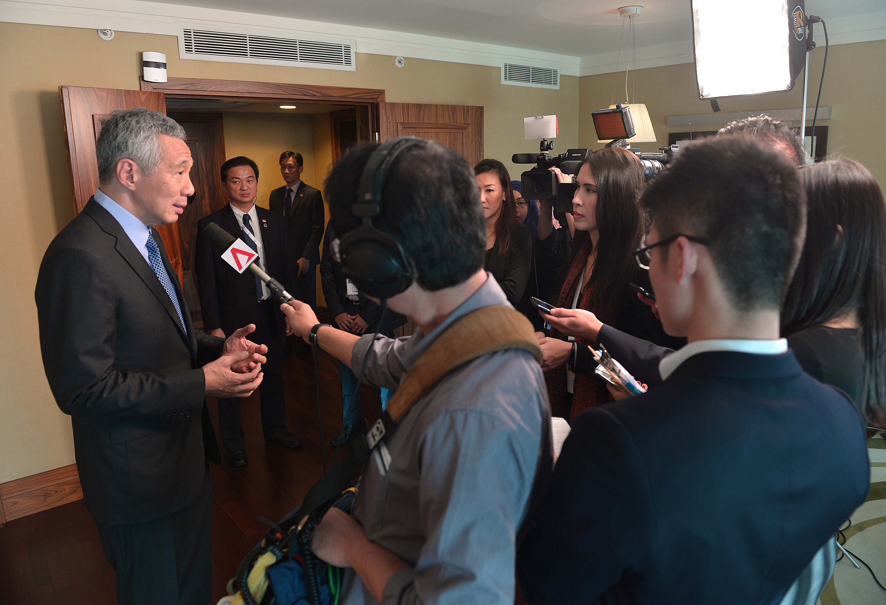 PM Lee speaking to Singapore journalists yesterday in his hotel suite at the conclusion of the G-20 Summit in Antalya, Turkey.