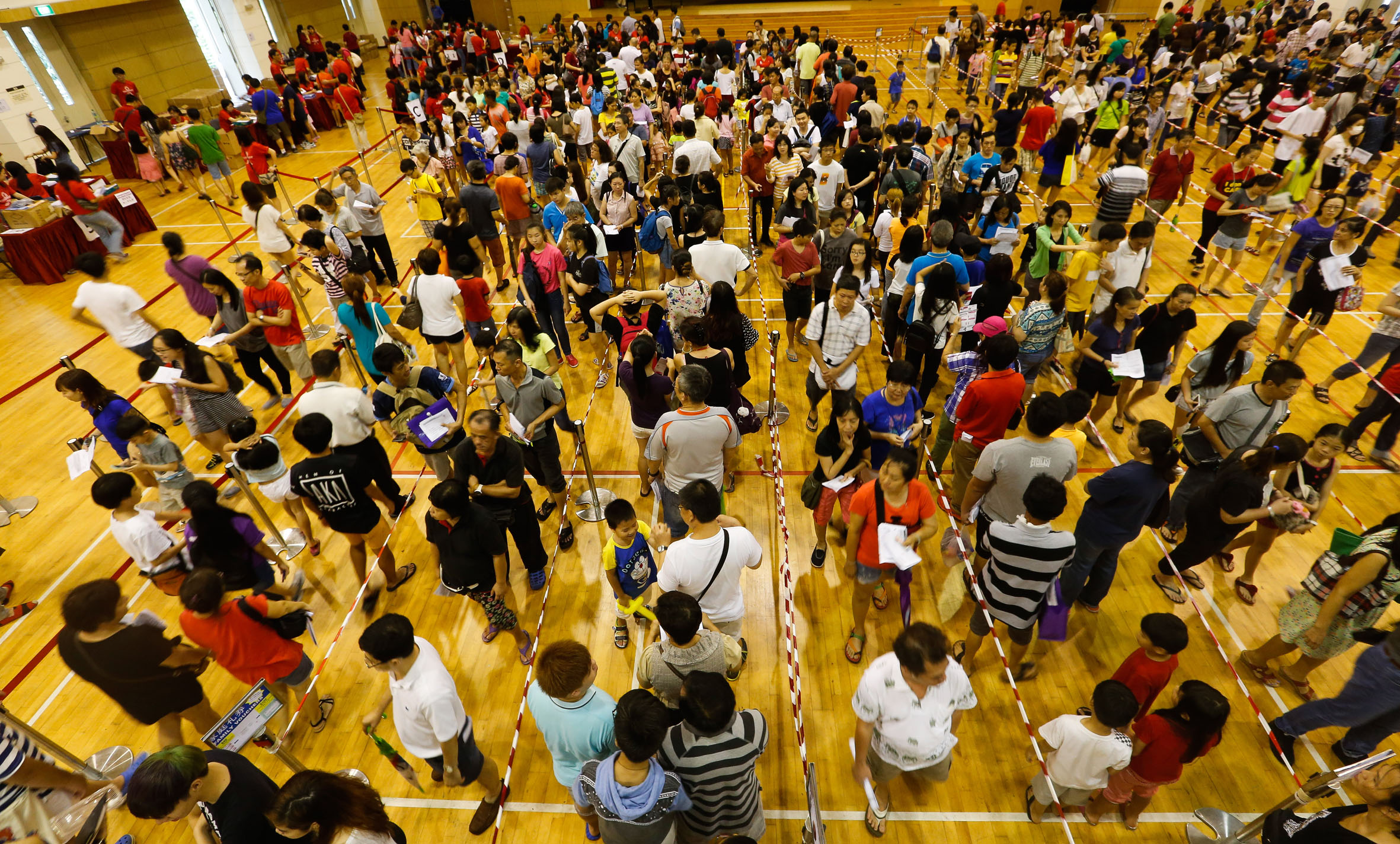 Some 6,000 low-income families with school-going children received help for the upcoming school year at the Chinese Development Assistance Council's annual "Ready for School" event yesterday at Nanyang Junior College. Acting Minister for Education (S