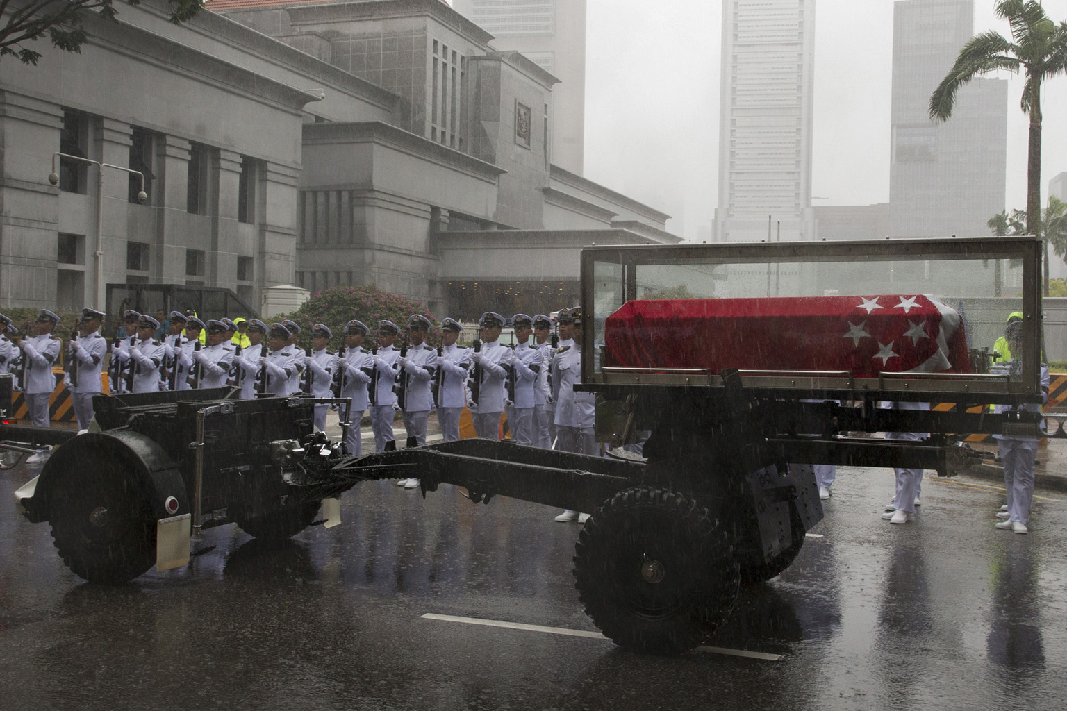 (Far left) On Aug 9, schoolchildren in LED costumes put up a performance that ended the National Day Parade at the Padang on a high note. (Left) On the night of Polling Day on Sept 11, PM Lee took this shot of a party supporter with her baby at Toa P