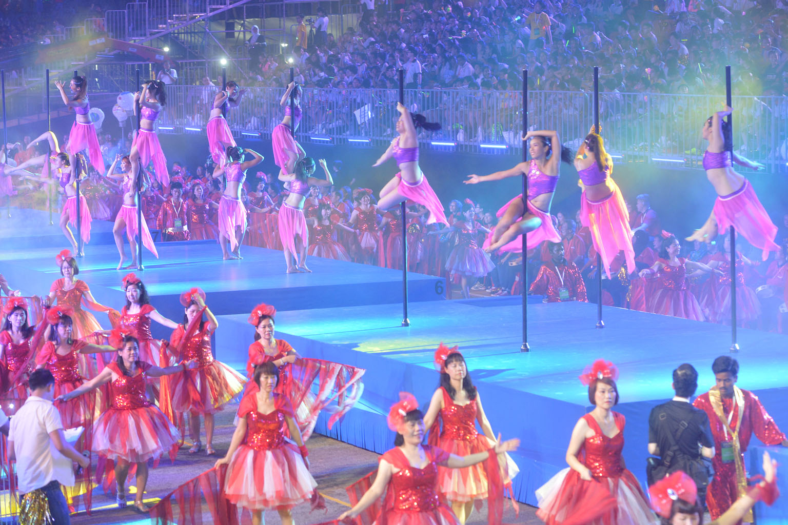 The F1 Pit Building was transformed into an underwater wonderland last night, as 270 performers clad in frilly costumes mimicked colourful marine life such as corals. Part of this year's Chingay National Education show, the fluid dance item was put o
