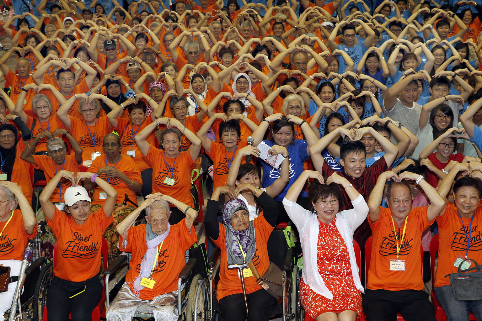 Ms Denise Phua (front row, fourth from left), Mayor of Central Singapore District, at a Chinese New Year celebration for needy elderly residents yesterday. Ms Phua wants volunteers who can commit consistently to visit vulnerable seniors regularly and
