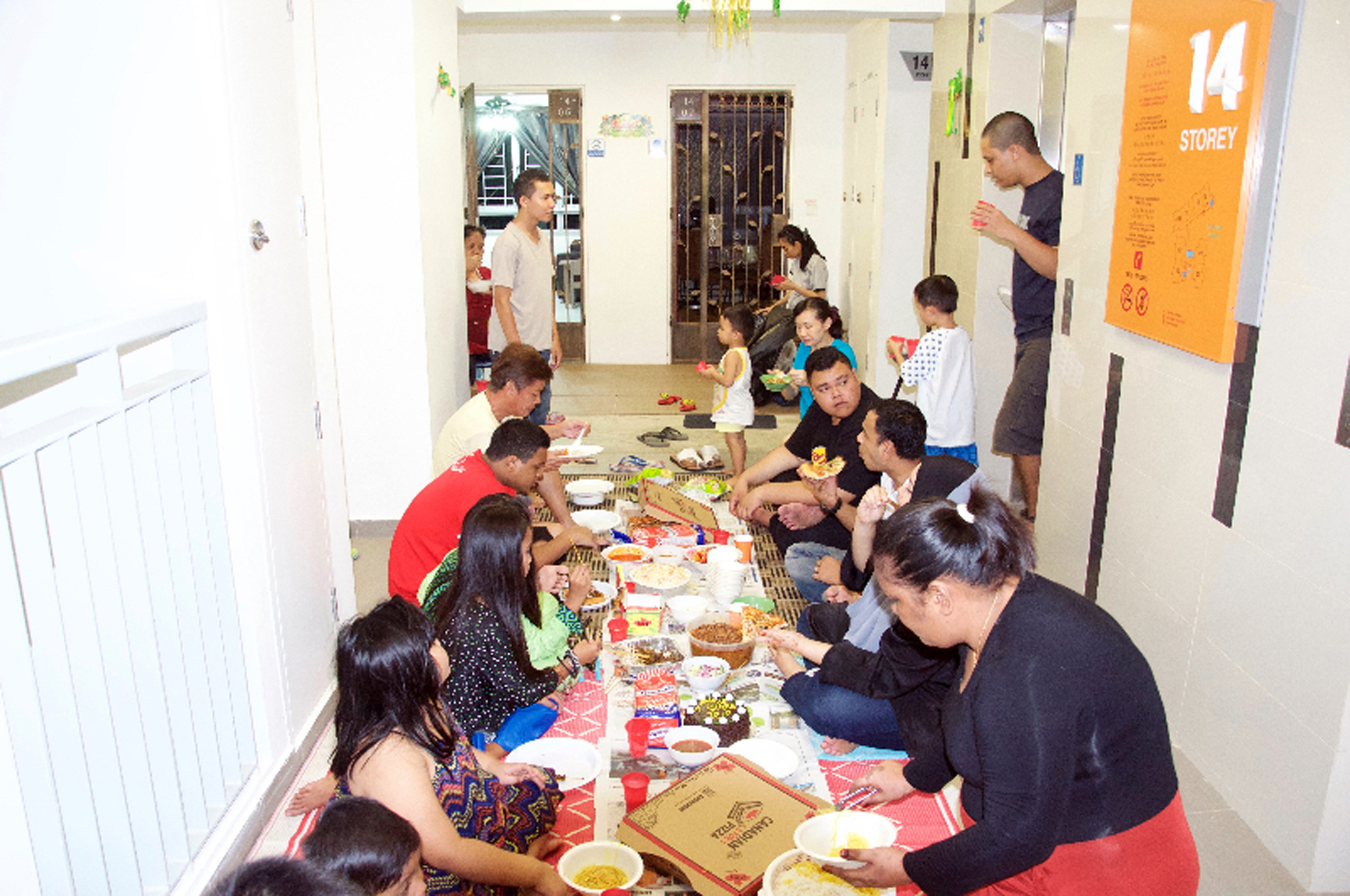 The Kampung Makan group gets residents in a Sembawang neighbourhood to eat together along their corridors every month.