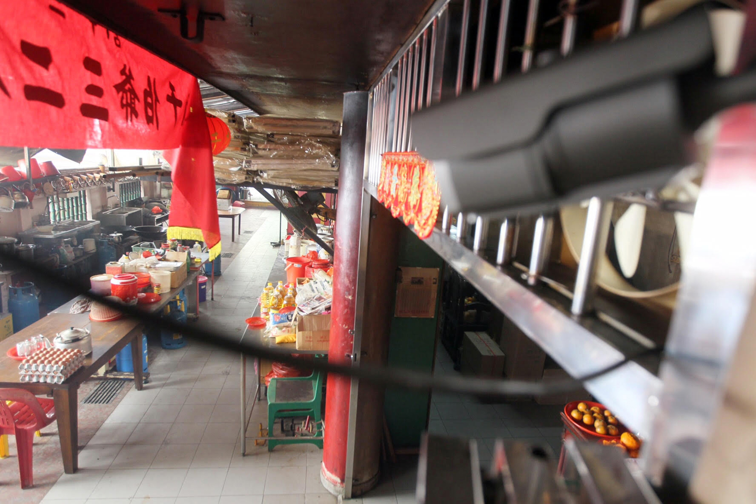 Mr Tan's sister believes he was killed for his money. She said CCTV footage showed a masked man climbing into the temple at night.