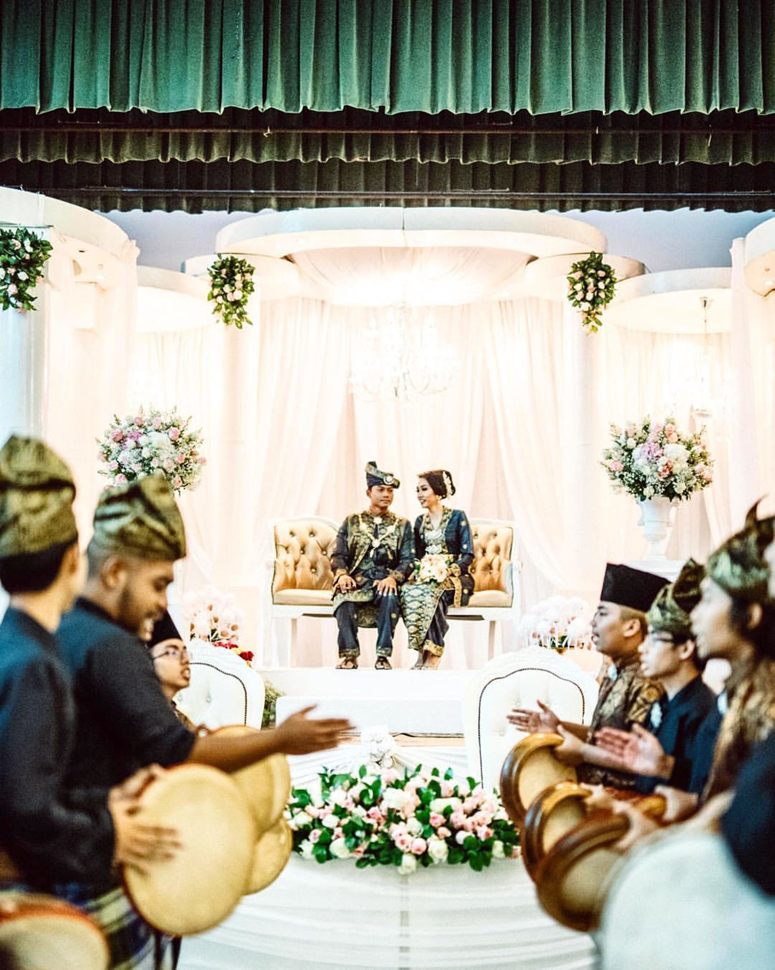 Mr Raizan and Ms Farhana held their wedding reception at Ulu Pandan Community Club on Jan 11. They were willing to spend more for air-conditioning plus they felt the void deck at their home was not ideal as space was limited, with obstructions like f