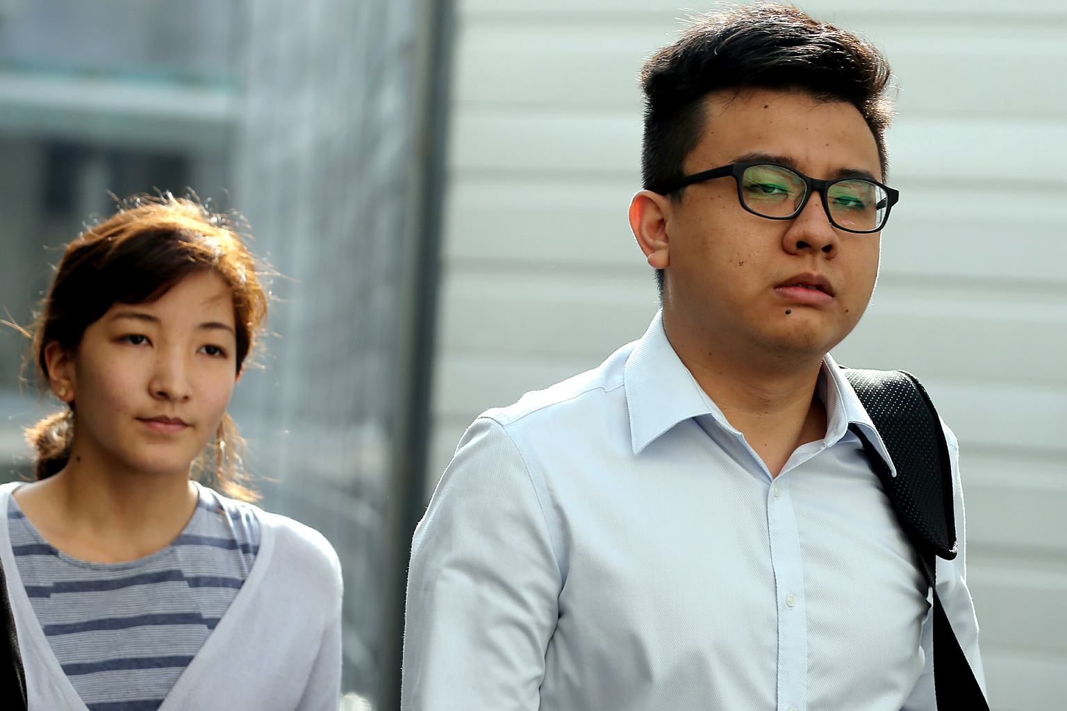 Takagi (left) pleaded guilty over several inflammatory articles posted on The Real Singapore website, while Yang claimed trial, saying his involvement lasted only about a month in 2012 and was "ad hoc" after that.