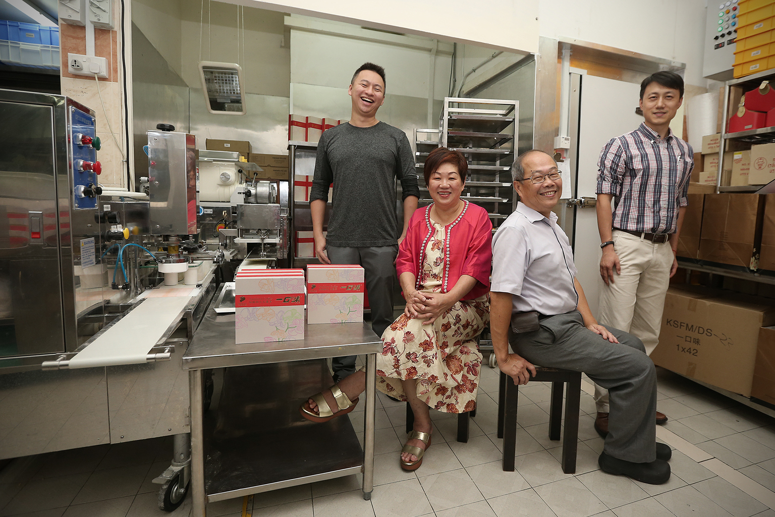 Among the people who have signed up for the course are (from left) Mr Chan, Madam Kohand Mr Chow Yee Leong, director of Kingstone Food Mart. Mr Zhou (right) said interest in the course, which targets executives in local SMEs, has been strong.