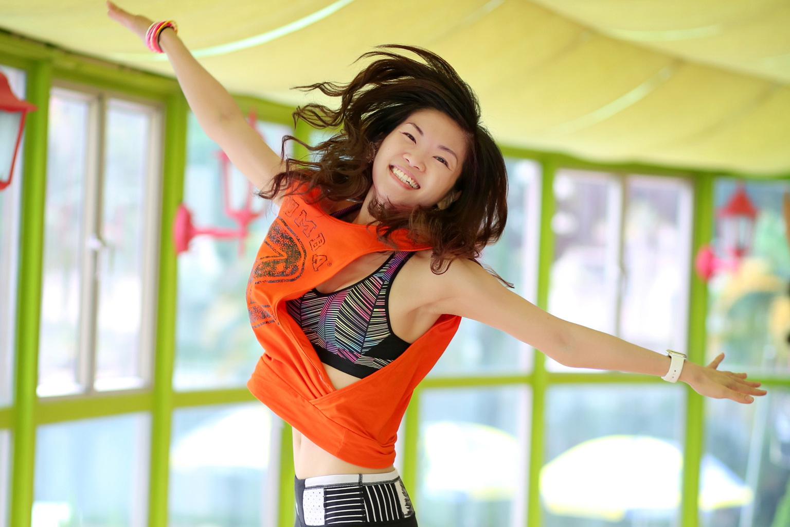 Ms Tan teaches Zumba five days a week, moves along with the students in her class and also does toning and other exercises while spending time with her family, including when watching TV.