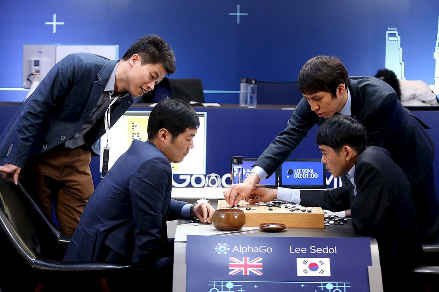 The world's top Go player, Mr Lee Sedol, reviewing his moves after the third match of the Google DeepMind Challenge Match against Google's artificial intelligence program AlphaGo in Seoul in March. The match comprised five games, of which AlphaGo won