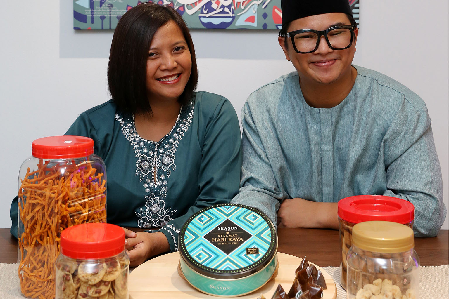 Mr Noor and Ms Kamaliah have started buying decorations and snacks for Kampung Raya on July 17, when they will welcome visitors from 9am to 11.30am and treat them to traditional Malay goodies. Green packets containing $2 each will be given to childre