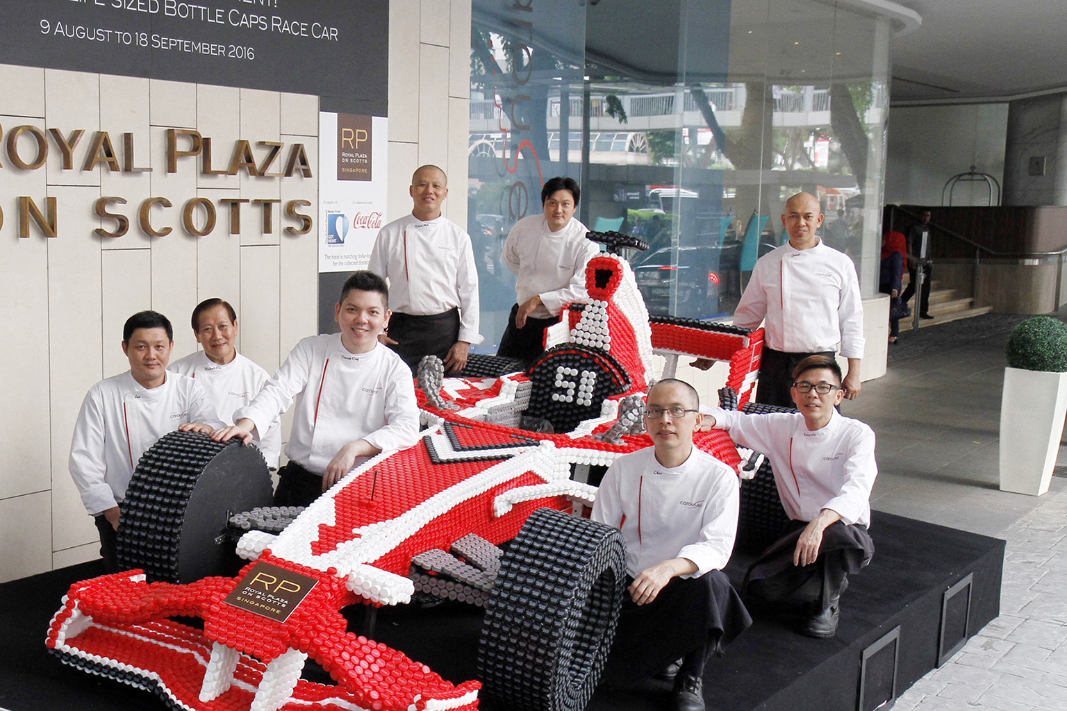 Here's a Formula One car that will always come out tops. The Royal Plaza on Scotts hotel unveiled earlier this week the world's first life-sized race car made out of bottle caps - more than 20,000 in total. To celebrate Singapore's ninth year as a Gr