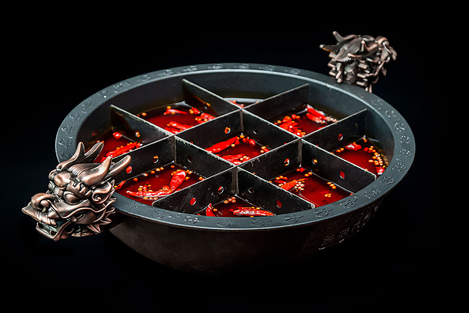 Spicy House has three types of communal hotpots, including one with nine compartments, where ingredients can be cooked separately.