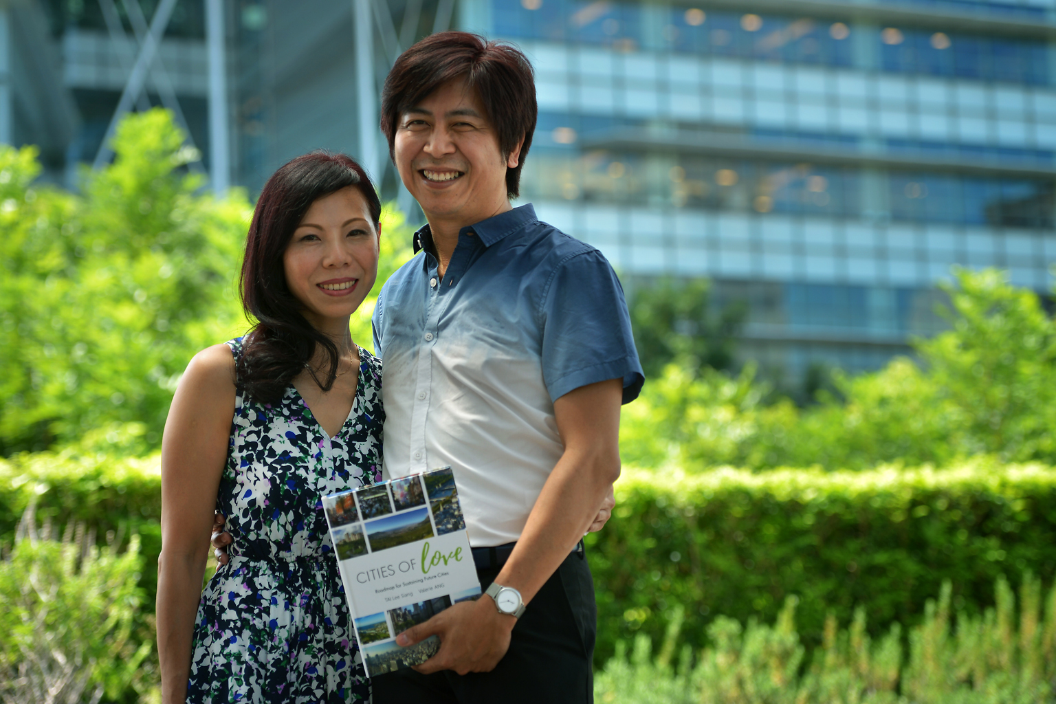 Mr Tai and wife Valerie with their book, Cities Of Love, which aims to show how city dwellers can play a part in contributing to the sustainability of cities worldwide.