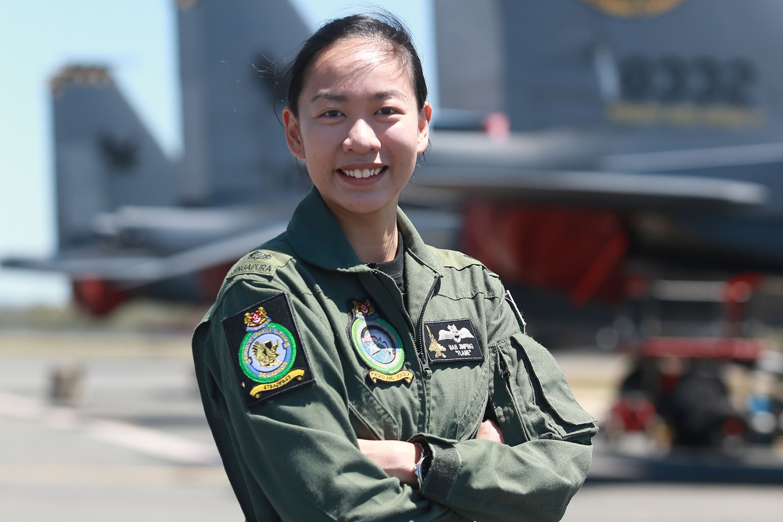 Major Nah says one thing she enjoys about flying is seeing the night view of Singapore as she returns to base after a mission.