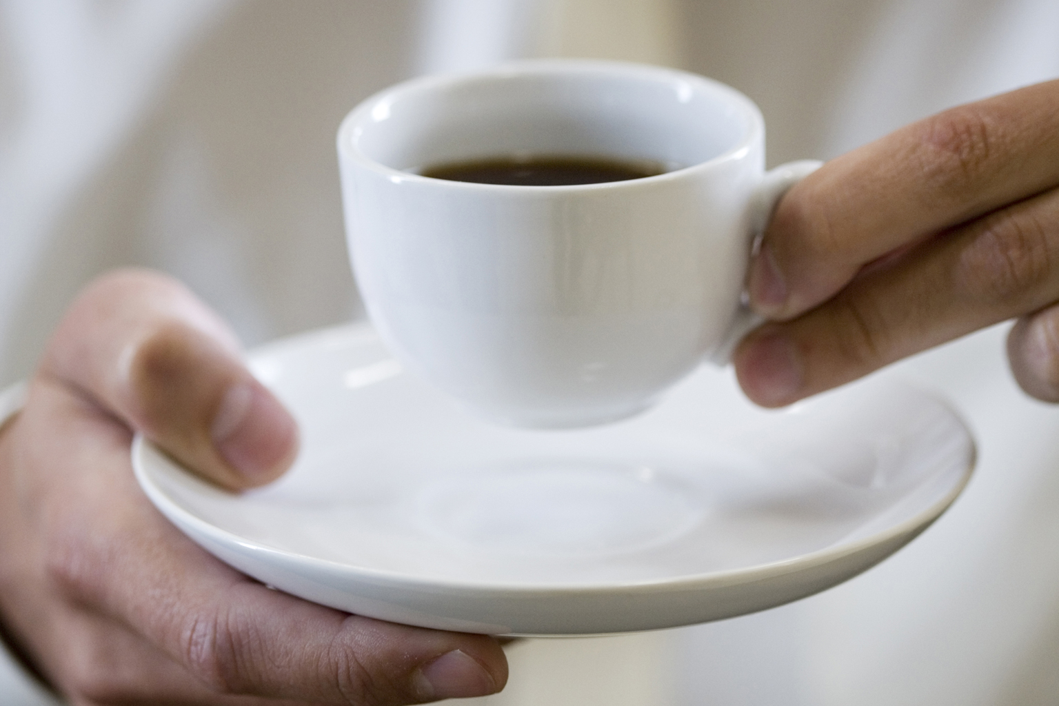 Too much caffeine is one of the causes of hand tremors.