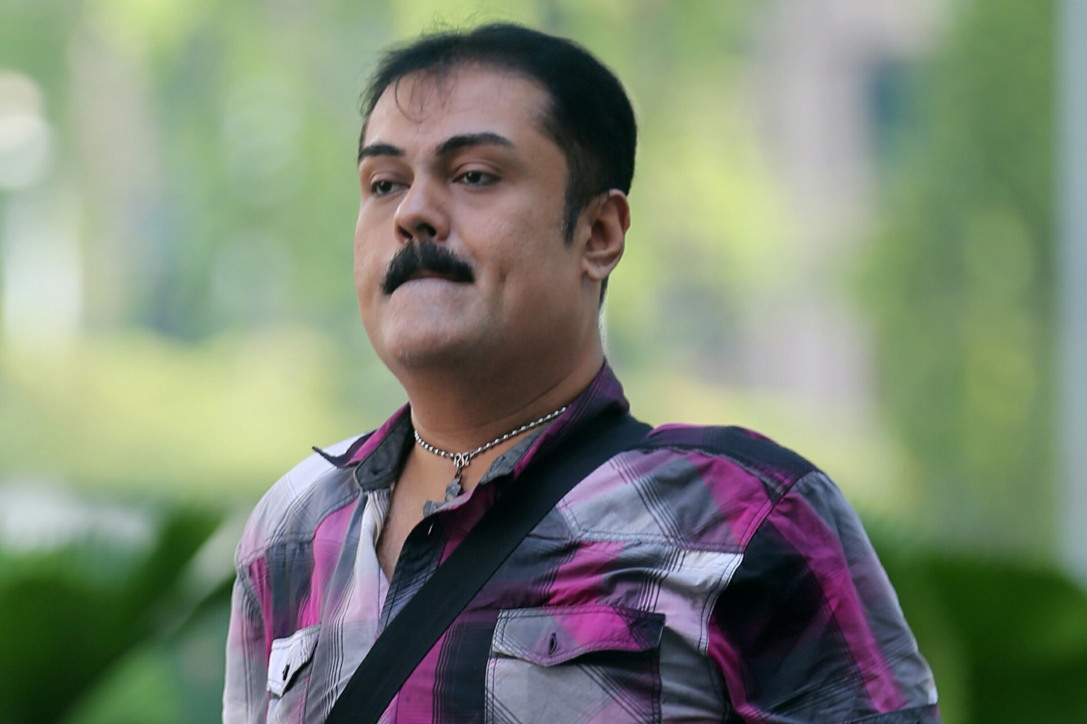 Darwinder Singh Sukhdev Singh (above) had been charged with abetting Ms Siti Nur Redha Khamis in feeding her mother faeces and urine.