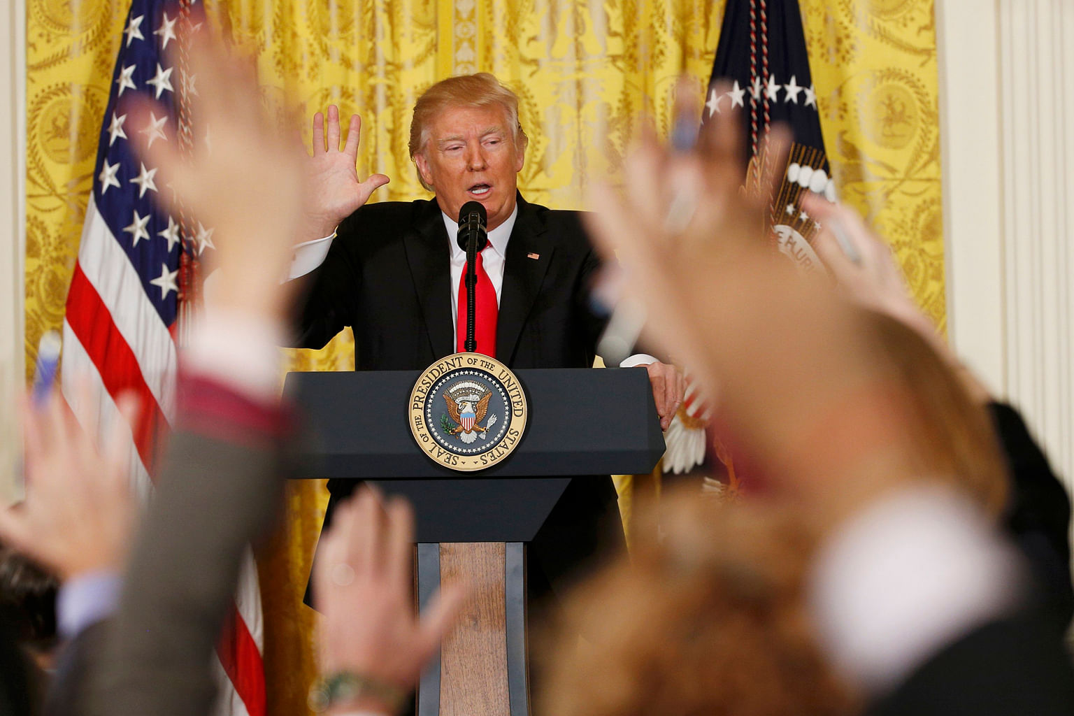 Mr Trump taking questions during a news conference at the White House in Washington last month. The writer says that if the US President gets his way, tariffs on imports could stoke inflation, which in turn could trigger higher US interest rates, tho