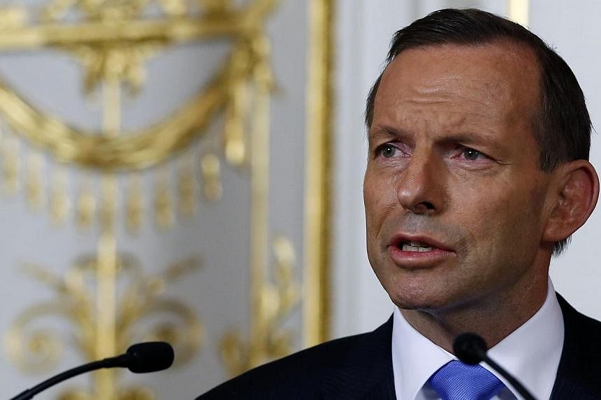 Australia's first budget under conservative Prime Minister Tony Abbott (above) to be released on Tuesday promises to end the "age of entitlement", with spending cuts and tax rises expected as the nation strives to rein in its deficit. -- FILE PHOTO: 