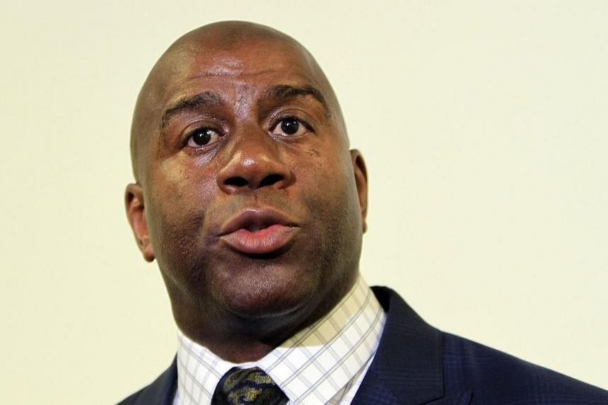 Hall of Famer Earvin "Magic" Johnson on Sunday reiterated his belief that the National Basketball Association (NBA) must oust embattled Los Angeles Clippers owner Donald Sterling, and said players will not play for his wife, Shelly, either. -- FILE P