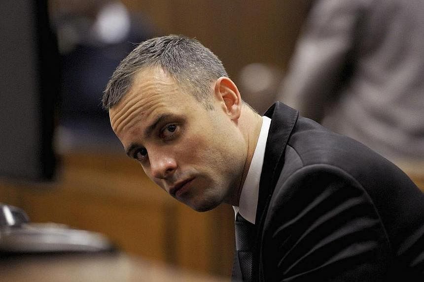 Oscar Pistorius sits in the dock during his trial at the North Gauteng High Court in Pretoria on May 12, 2014.&nbsp;Oscar Pistorius's murder trial resumed on Monday, May 12, 2014, with a psychiatrist telling the court the sprinter had an "anxiety dis