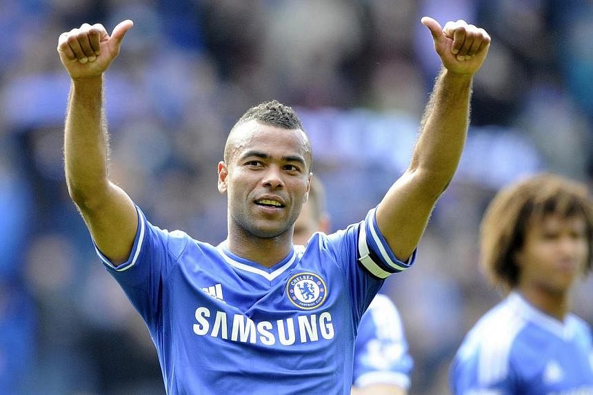 Chelsea's Ashley Cole acknowledges the Chelsea fans during their English Premier League soccer match at Cardiff City Stadium in Cardiff, Wales on May 11, 2014. -- PHOTO: REUTERS