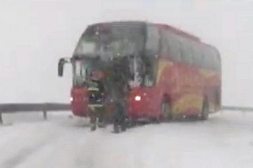 More than 90 Singaporeans were trapped in a snowstorm for more than three hours on Sunday, after their bus got stuck in snow on Mount Wutai in China's Shanxi province. The tourists, many of them elderly, had to wait in temperatures as low as minus 15