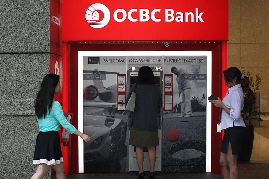 The new function on the updated OCBC Mobile Banking app allows its e-banking customers to send up to $100 to any Facebook friend without needing the recipient's bank account details. -- ST FILE PHOTO: KEVIN LIM
