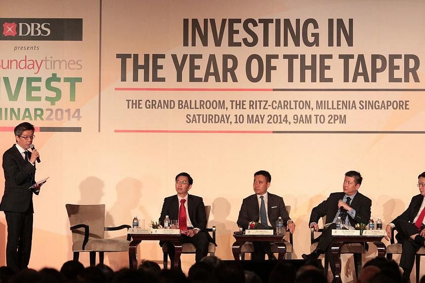 The panel was moderated by Mr Lim Say Boon (extreme left). The panel consists of (from left to right) Mr Alvin Foo, Economics Correspondent at The Straits Times; Mr Clifford Lee, Managing Director and Head of Fixed Income at DBS Bank; Mr Dennis Chan,