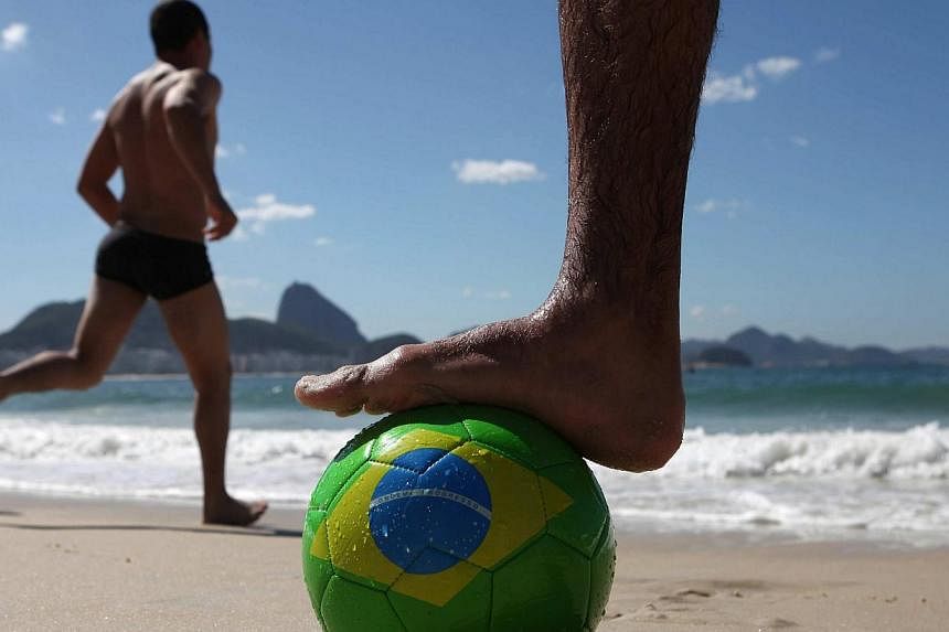 A month away from hosting the World Cup, Brazil on Monday launched a new international tourism campaign designed to reach more than a billion people, insisting expected anti-Cup protests will not spoil the show. -- PHOTO: EPA