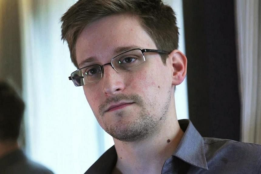 Edward Snowden was profoundly at peace with his decision to leak national security documents, and even joked about the consequences, journalist Glenn Greenwald says in a new book. -- FILE PHOTO: REUTERS