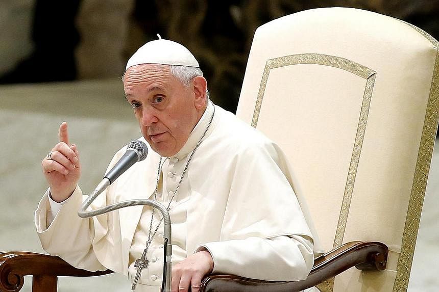 Pope Francis on Monday declared that everyone has the right to be baptised, even aliens should they come knocking on the church's door. -- PHOTO: EPA