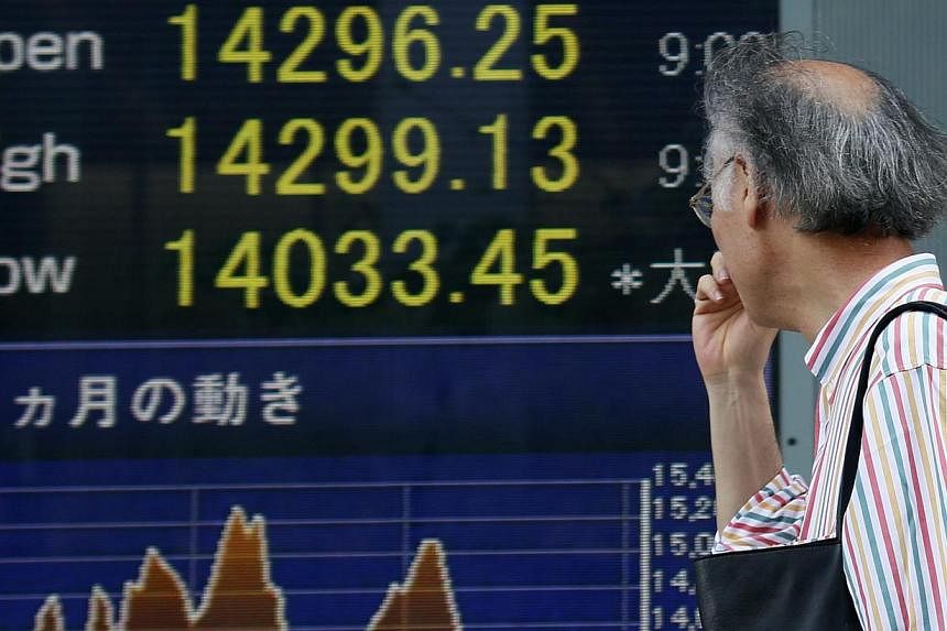 Tokyo stocks opened 1.54 per cent higher on Tuesday after record-setting advances on Wall Street. -- FILE PHOTO: EPA
