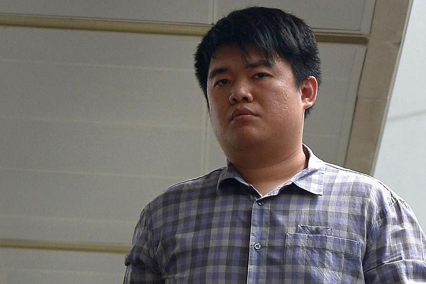 Quek Zhen Hao (above) was accused of two counts of driving in a rash manner and one of displaying threatening behaviour towards a female motorist. -- ST PHOTO: NG SOR LUAN &nbsp;