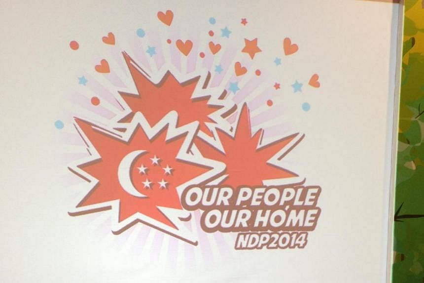 This year's NDP logo comprises red speech bubbles, one of which contains the crescent moon and five stars of the flag. -- ST PHOTO:&nbsp;ROYSTON SIM