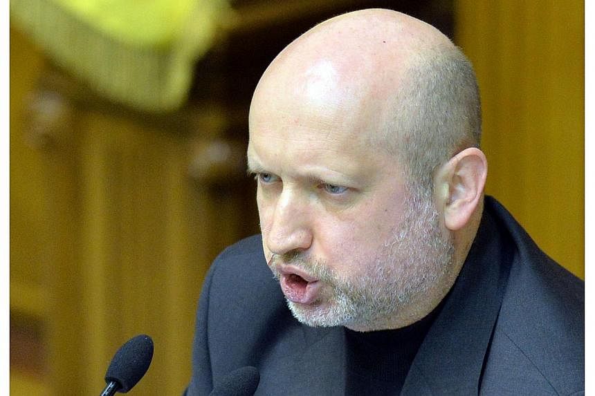 Interim President Oleksandr Turchynov said on Wednesday as he opened round-table talks on Ukraine's deepening crisis that Kiev was ready to listen to pro-Russian rebels in the east but would not bow to blackmail. -- FILE PHOTO: AFP