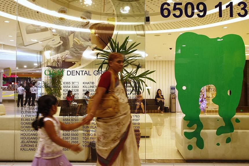 Q&amp;M dental clinic located in the City Square Mall on Dec 27, 2012. Q&amp;M Dental Group said on Wednesday its net profit for the first quarter ended March 31 rose 37 per cent from a year ago to $1.5 million. -- ST FILE PHOTO