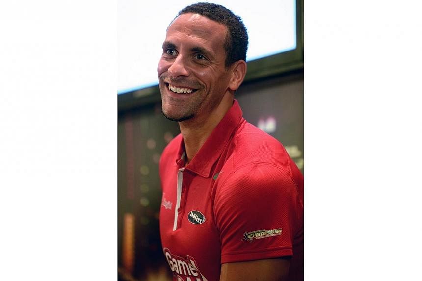 Former Manchester United player Rio Ferdinand attends a press conference in Singapore on May 15, 2014 for the SG Game ON! Ultimate Selfie Challenge.&nbsp;He may have been a loyal servant to England but Rio Ferdinand believes that Roy Hodgson's men ha