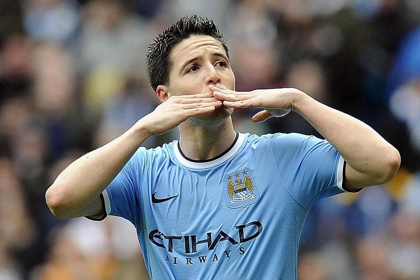 Manchester City Samir Nasri celebrates scoring a goal against West Ham United during the English Premier League soccer match between Manchester City vs West Ham United at the Etihad Stadium in Manchester, Britain on 11 May 2014.&nbsp;Nasri said on We