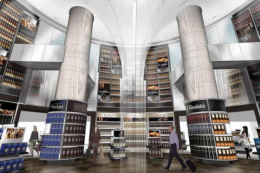 An artist's impression of a DFS shop to be opened at Changi's T3. The terminal will also boast a members-only lounge and a Long Bar - concepts that have not been seen before at other airports, says DFS. -- PHOTO: CHANGI AIRPORT GROUP
