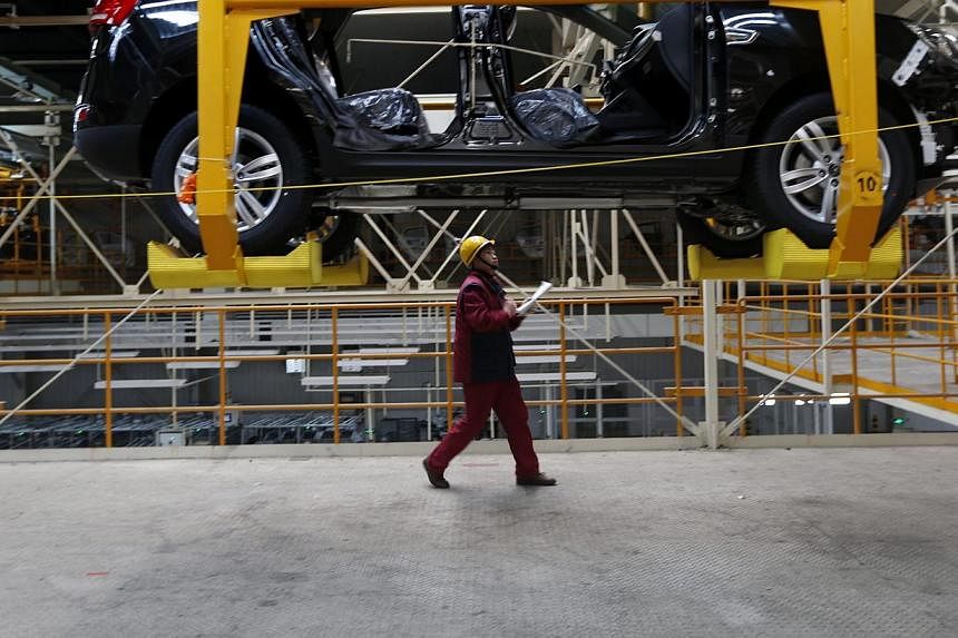 A worker at a Chinese car factory in Hefei, Anhui province. The attractiveness of Chinese and American markets to foreign firms depends on the profits to be made in international terms, not as measured by the workers' domestic purchasing power.