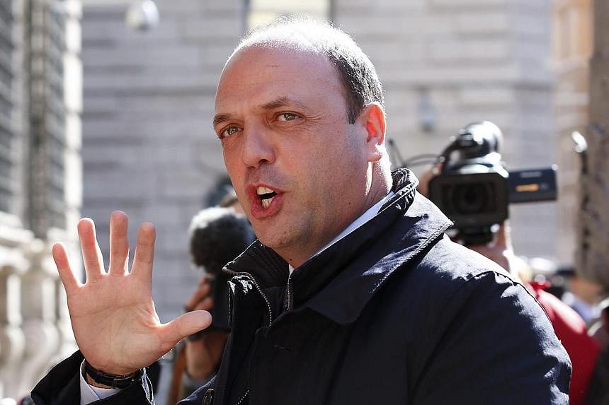 Italy's Interior Minister Angelino Alfano is working on a proposal for lifetime stadium bans for football hooligans following violence before this month's Cup final in which three Napoli fans were shot. -- FILE PHOTO: REUTERS