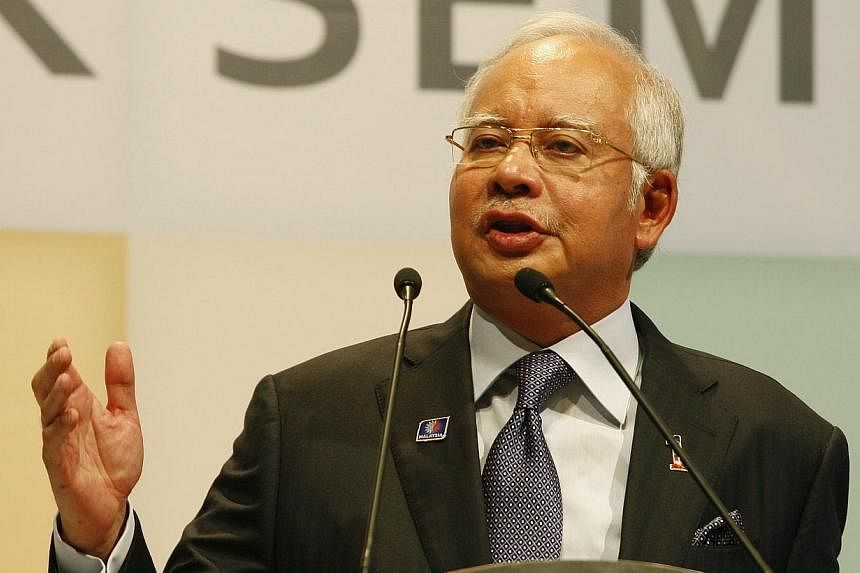 Umno and Prime Minister Datuk Seri Najib Razak have served three letters of demand on online news portal Malaysiakini, editor-in-chief Steven Gan and chief editor Fathi Aris Omar over two allegedly defamatory articles published on Wednesday. -- FILE 