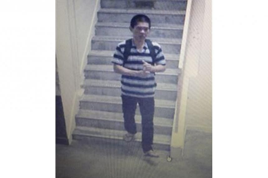 Police are looking for this person to assist with investigations into a case of attempted housebreaking along Tampines Street 21 on Feb 26, 2014. -- PHOTO: SINGAPORE POLICE FORCE&nbsp;