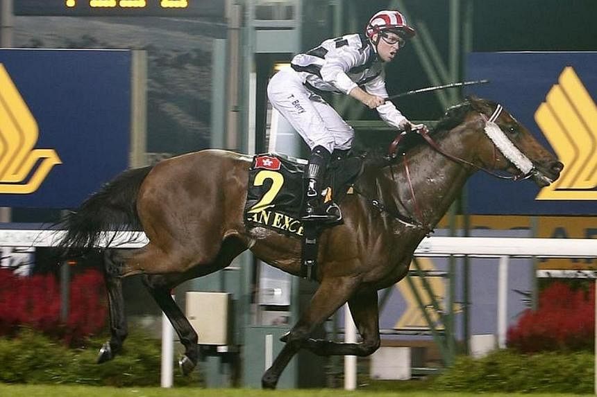 Tommy Dean Berry of Australia rides Dan Excel to victory during the Singapore Airlines International (SIA) Cup horse race at Singapore Turf Club on May 18, 2014.&nbsp;Last year's runner-up Dan Excel won the $3 million Singapore Airlines Cup (SIA Cup)