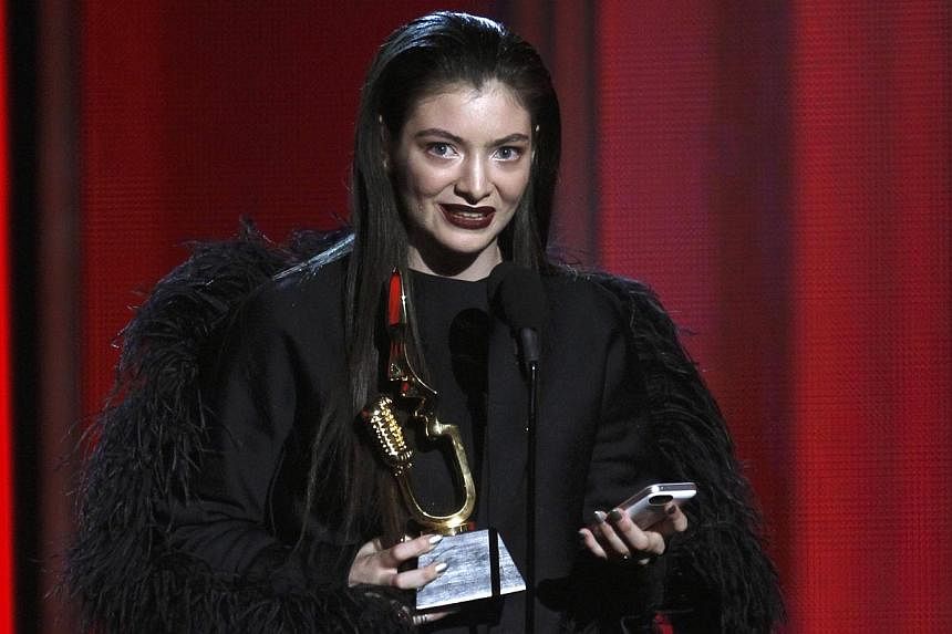 Singer Lorde accepts the top new artist award onstage at the 2014 Billboard Music Awards in Las Vegas, Nevada on May 18, 2014. -- PHOTO: REUTERS