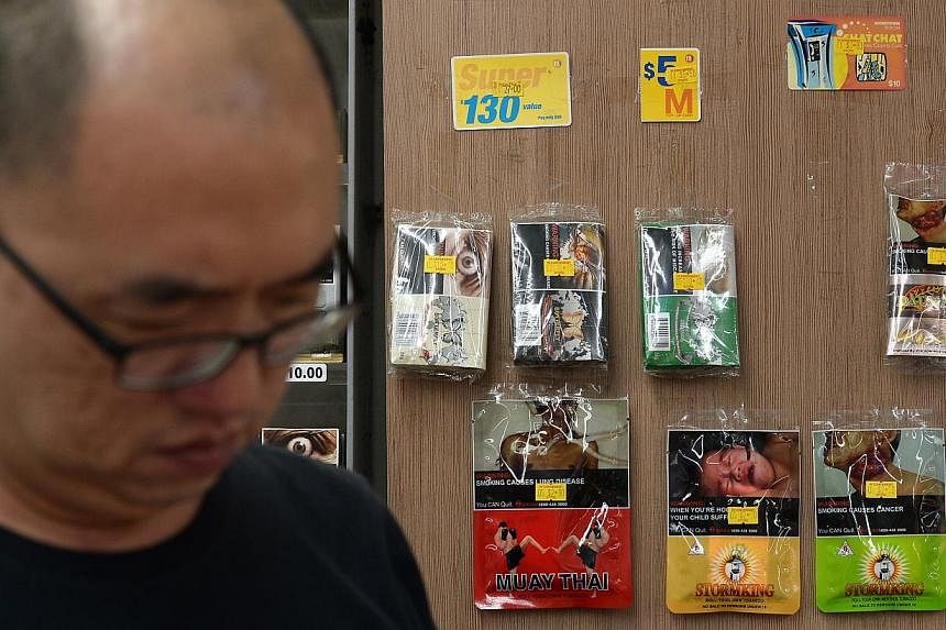 The Health Promotion Board is studying New York's recent move to increase the minimum age for cigarette purchase from 18 to 21. -- ST PHOTO: NG SOR LUAN